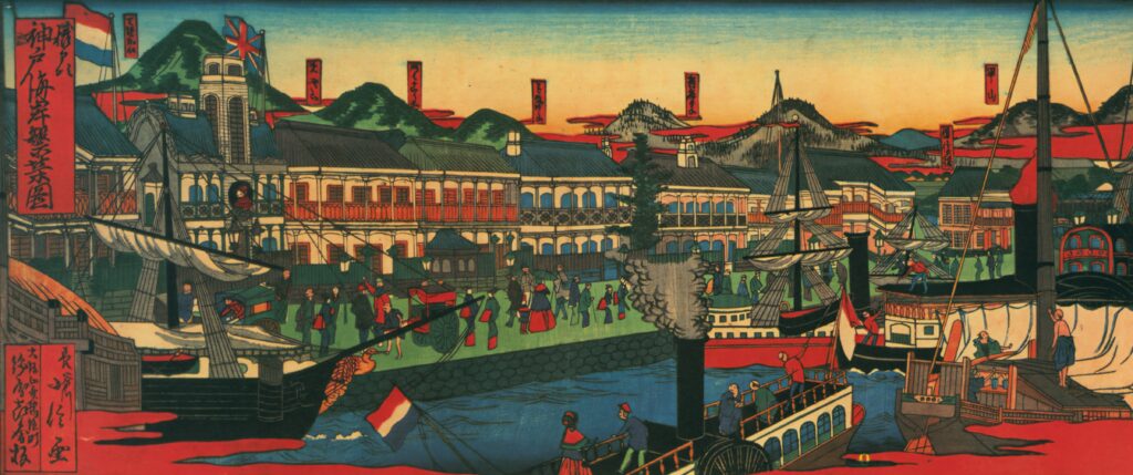 明治時代の神戸の港に船が着いているところ。

